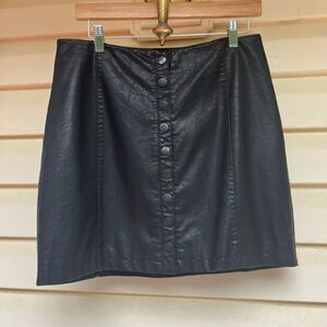 Free People black faux leather miniskirt,snap front closure,4 (see measurements)